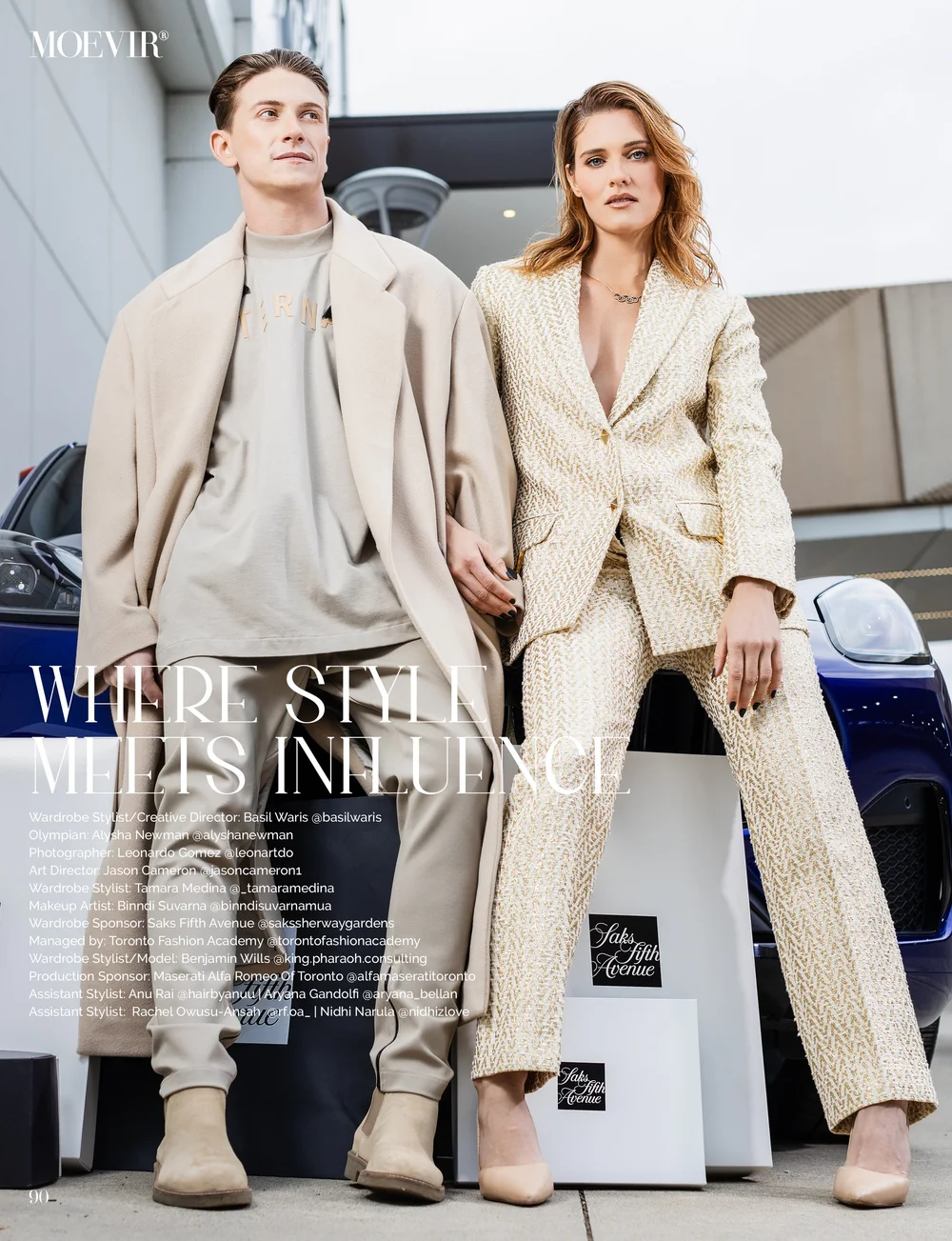 Benjamin Wills with a model in a luxury editorial photographed beside a performance car.